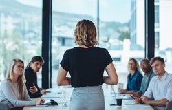 Female business leader conducting a meeting