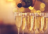 Champagne being poured at a party or event